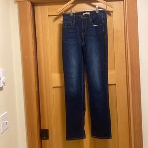 Woman’s size 4 Dark Blue Denim Levi Jeans (505 Straight)
